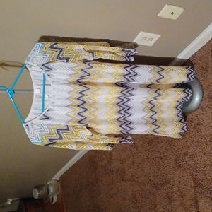 Knee length dress, polyester, never been worn.